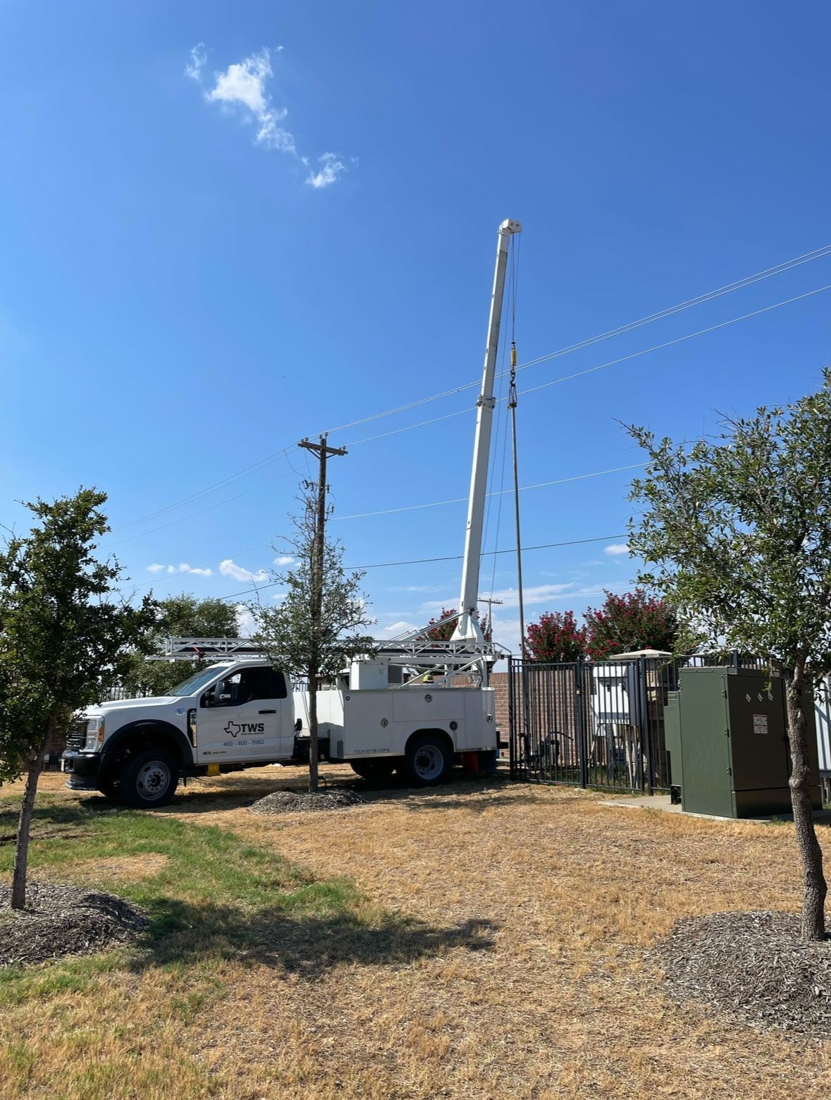 well services truck parked at the gate