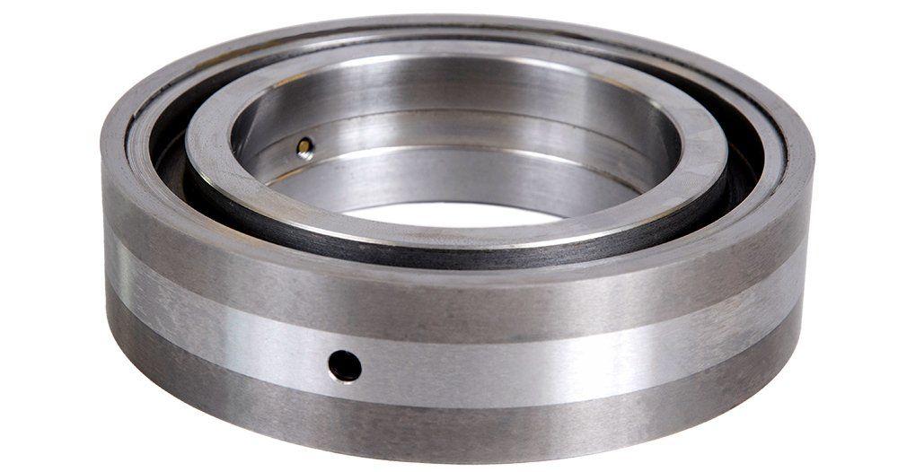 A close up of a metal ring with a hole in the middle