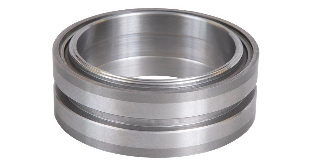 A close up of a metal ring on a white background