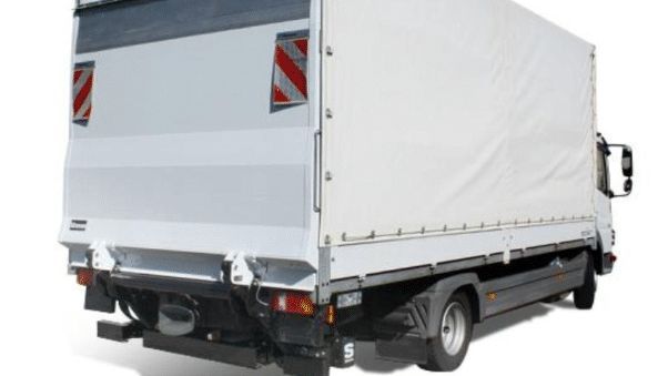 Rear view of a white box truck with a canvas side, safety reflectors, and a black bumper.