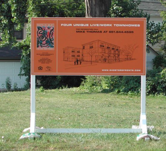 Orange real estate sign advertising 