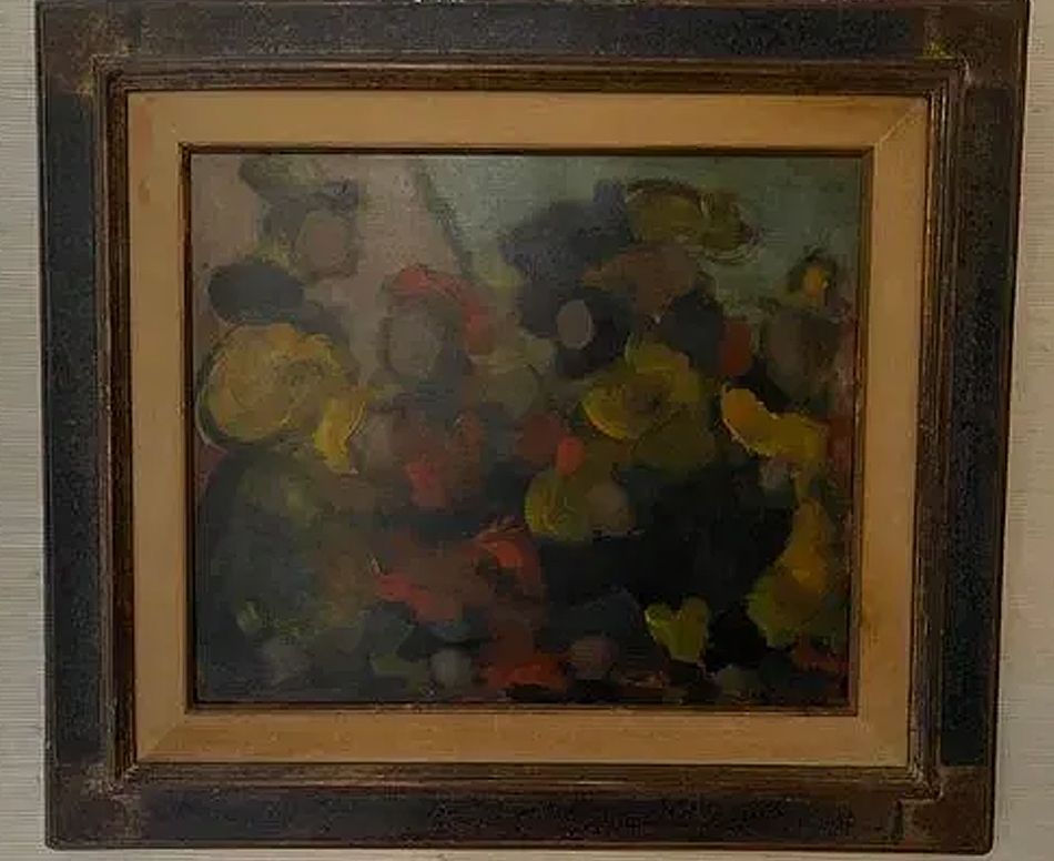 Abstract painting in a dark wooden frame, with yellow and dark green forms.