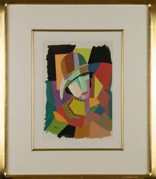 Abstract portrait of a person in a hat, created with colorful geometric shapes; framed in gold.