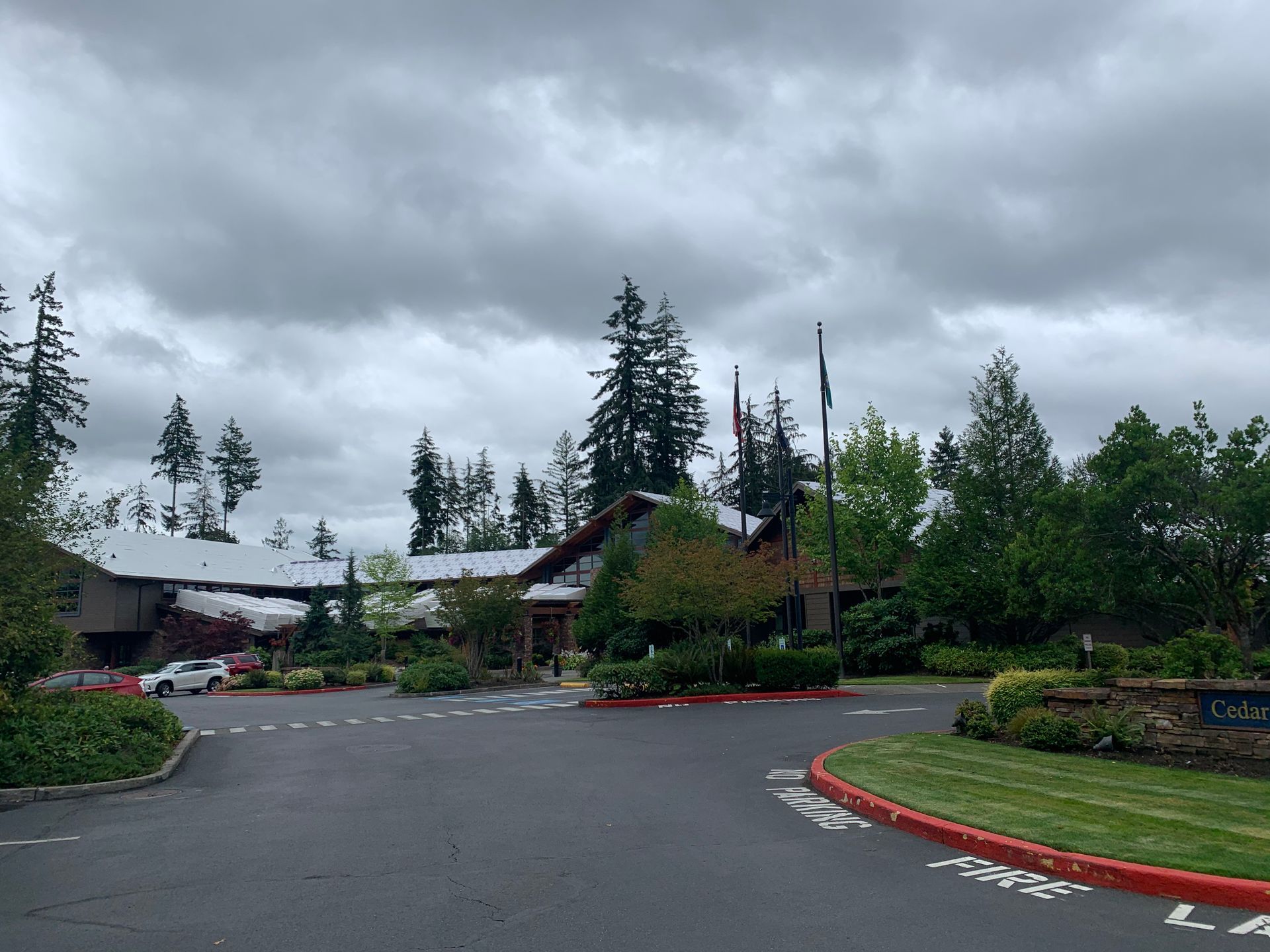 A large building with a lot of trees in front of it