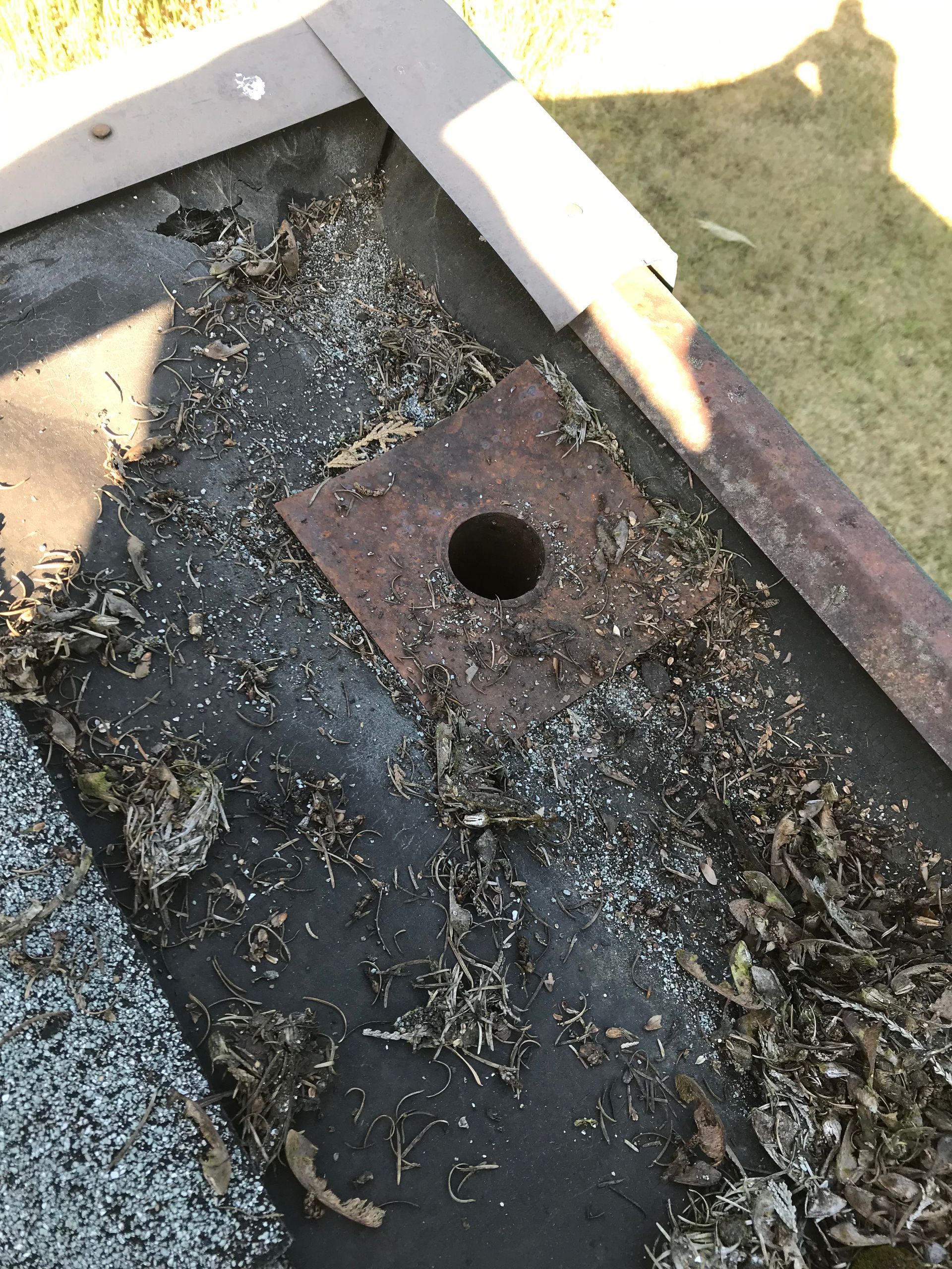 There is a hole in the roof that looks like a hole in the ground.