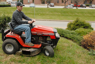 Man riding lawnmower