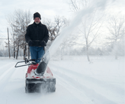 Man using a snow blower