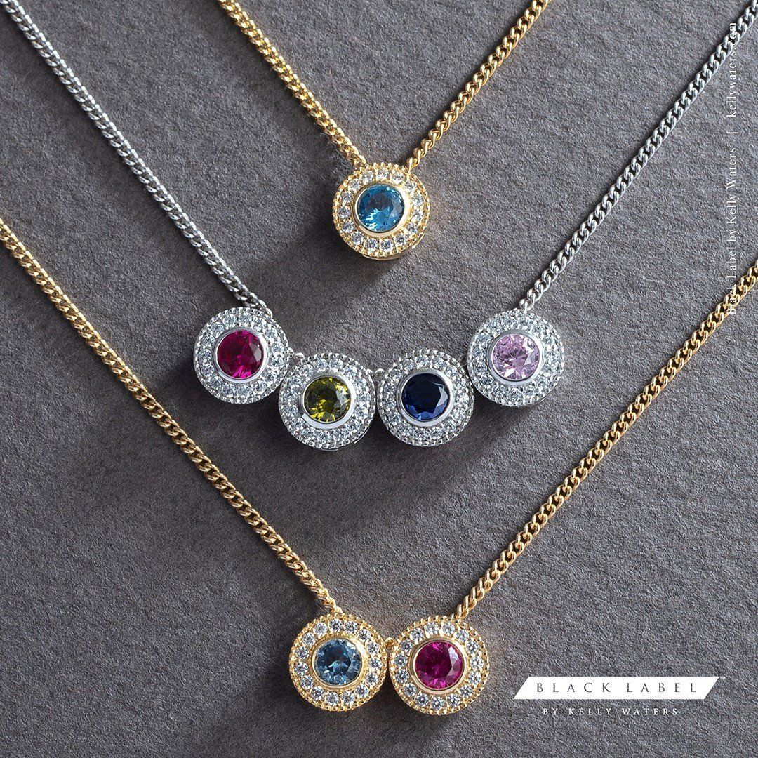 2 gold necklaces and a silver necklace