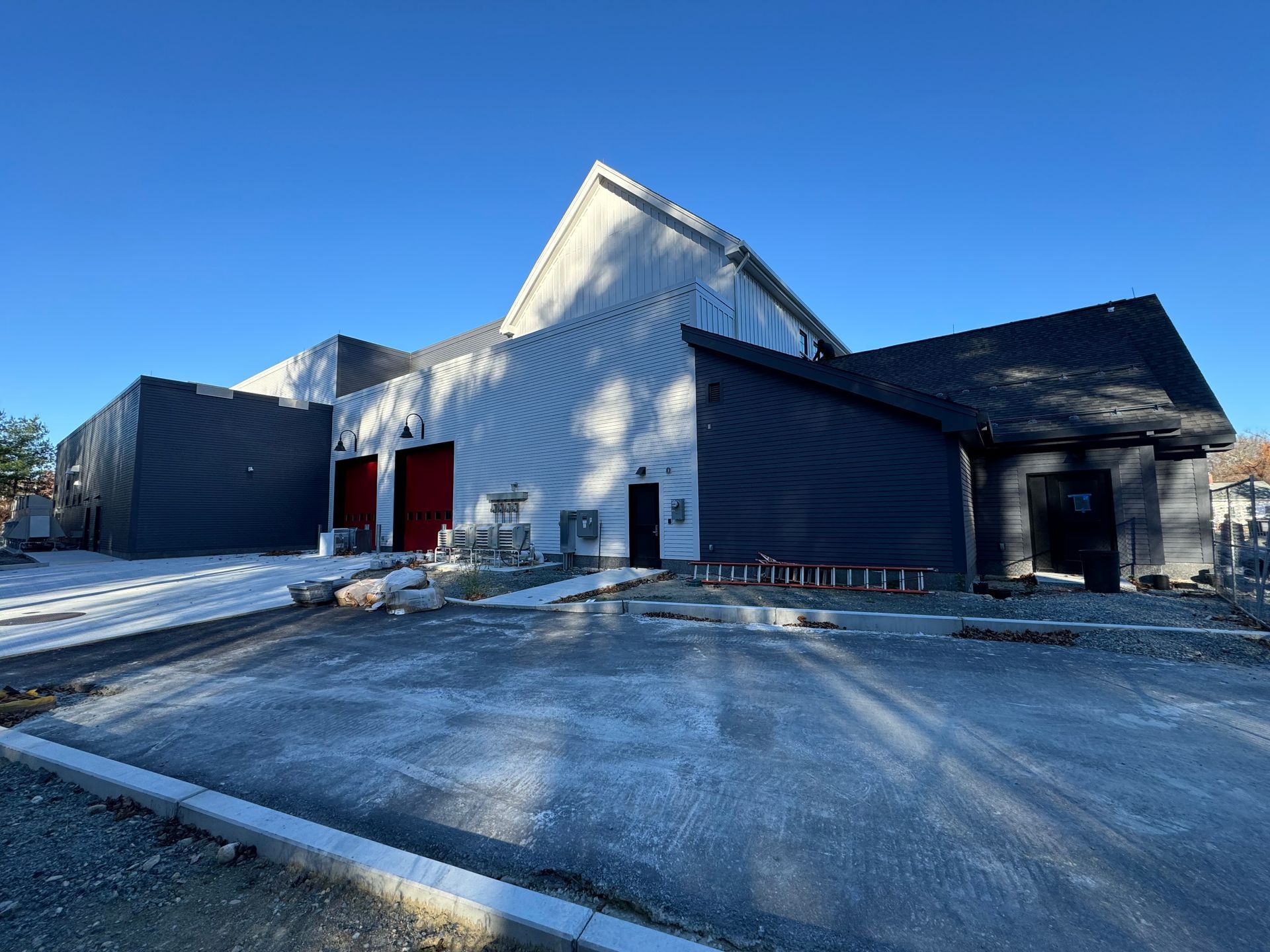 A large building with a lot of windows is being built.