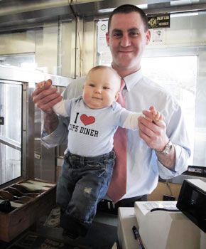 Man carrying a baby