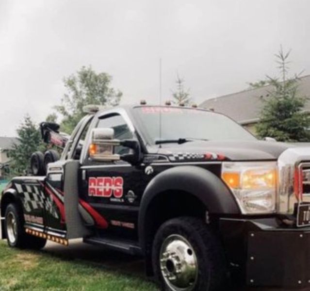 Black and red tow truck with 