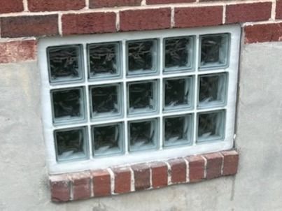 Glass Block window on red brick wall