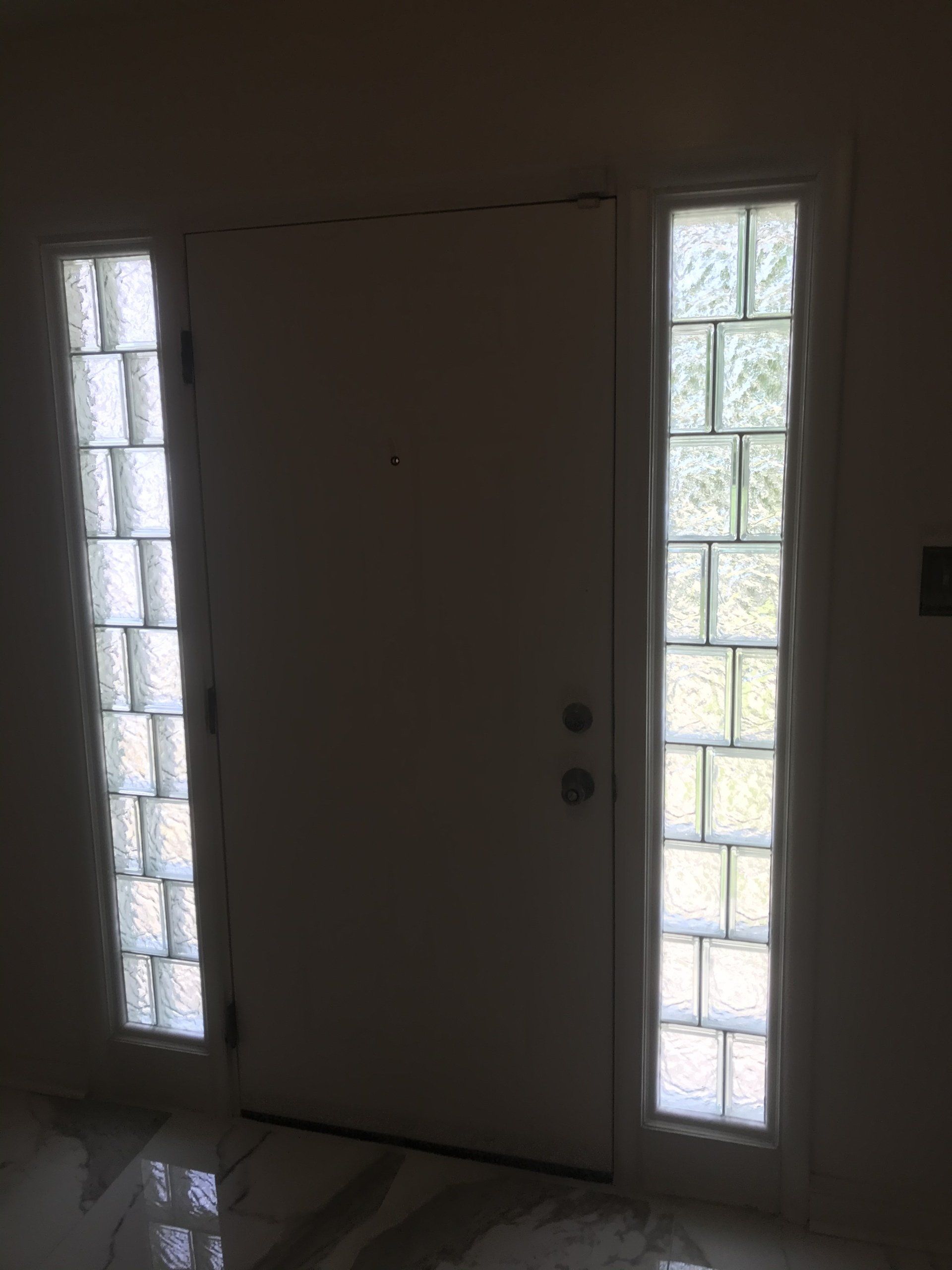 Glass block windows installed beside the door