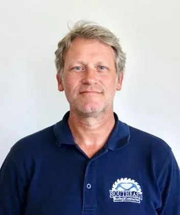 Man in blue shirt, logo