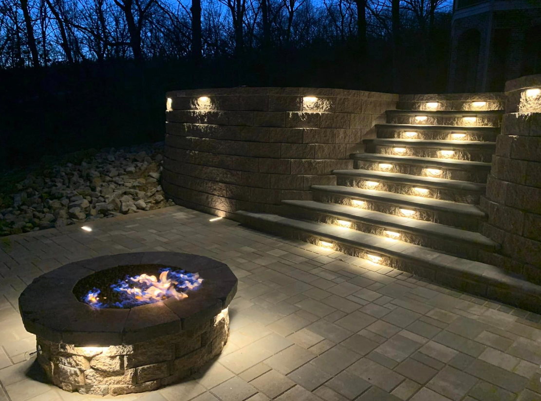 fire pit and stairs with lights