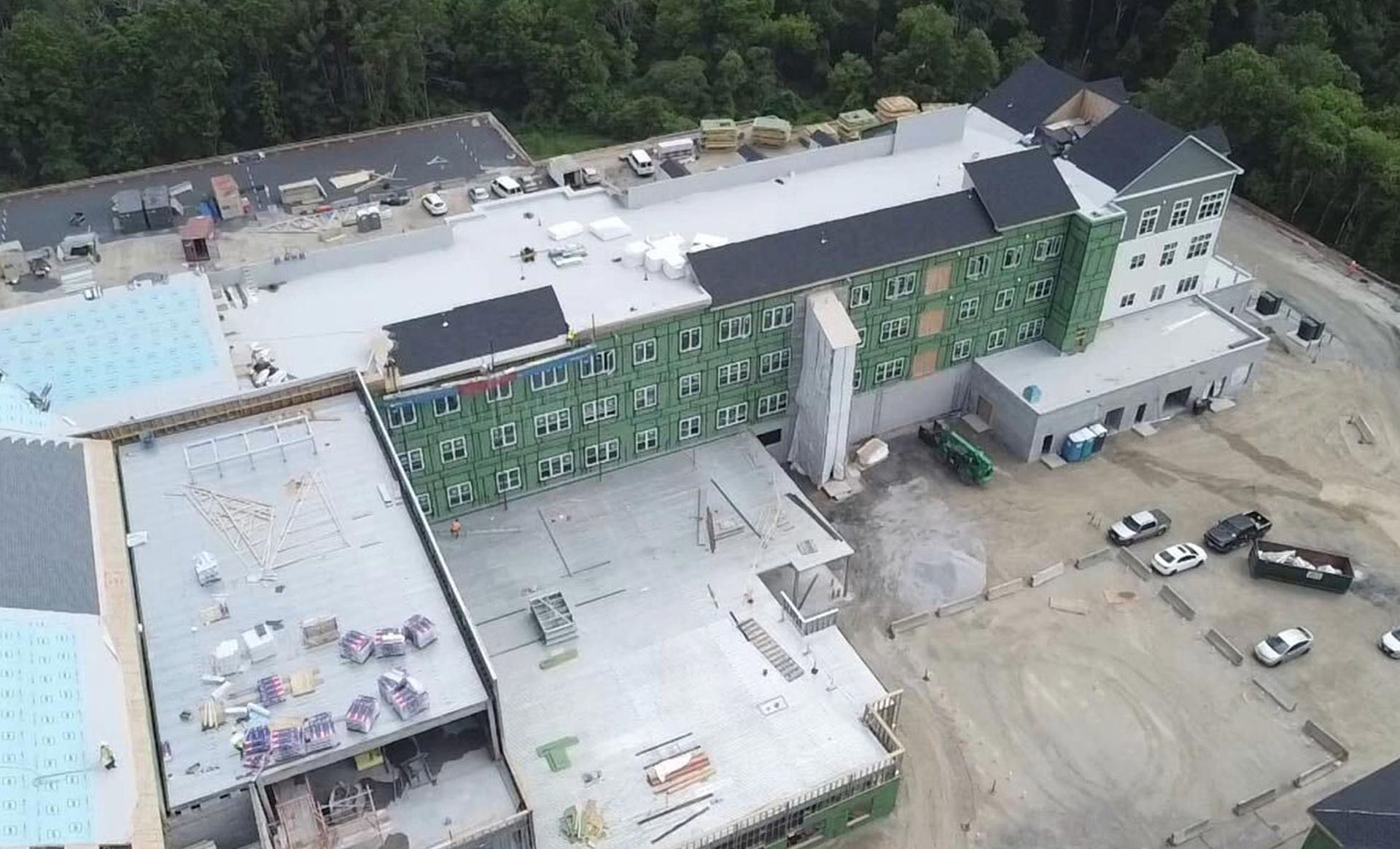 An aerial view of a large building under construction