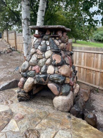Backyard Makeover rock chimney