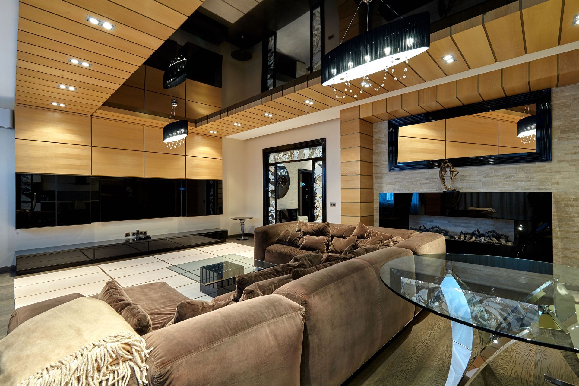 A living room with a couch and a glass table