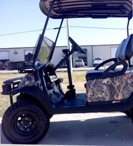 Golf cart with a camouflage vinyl