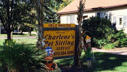 Charlene's Pet Sitting Service sign board