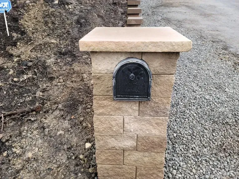 Mailbox with bricks panel