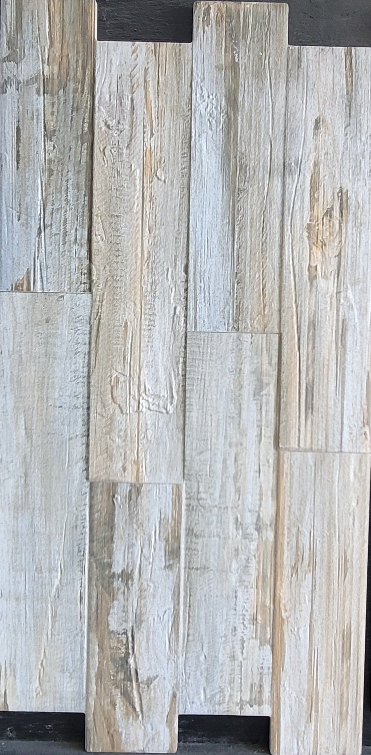 A close up of a piece of wood sitting on top of a table.