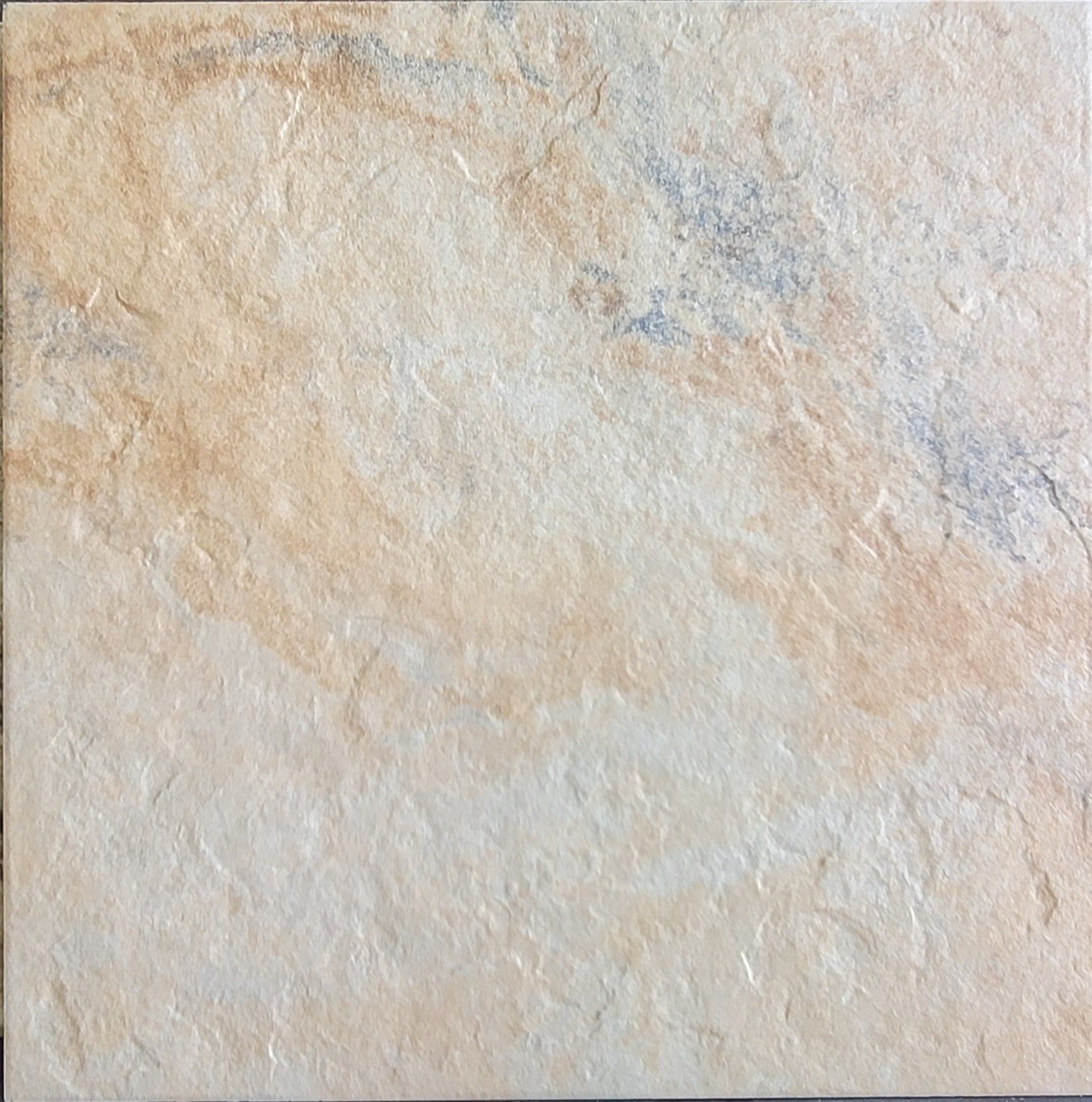 A close up of a tile that looks like marble