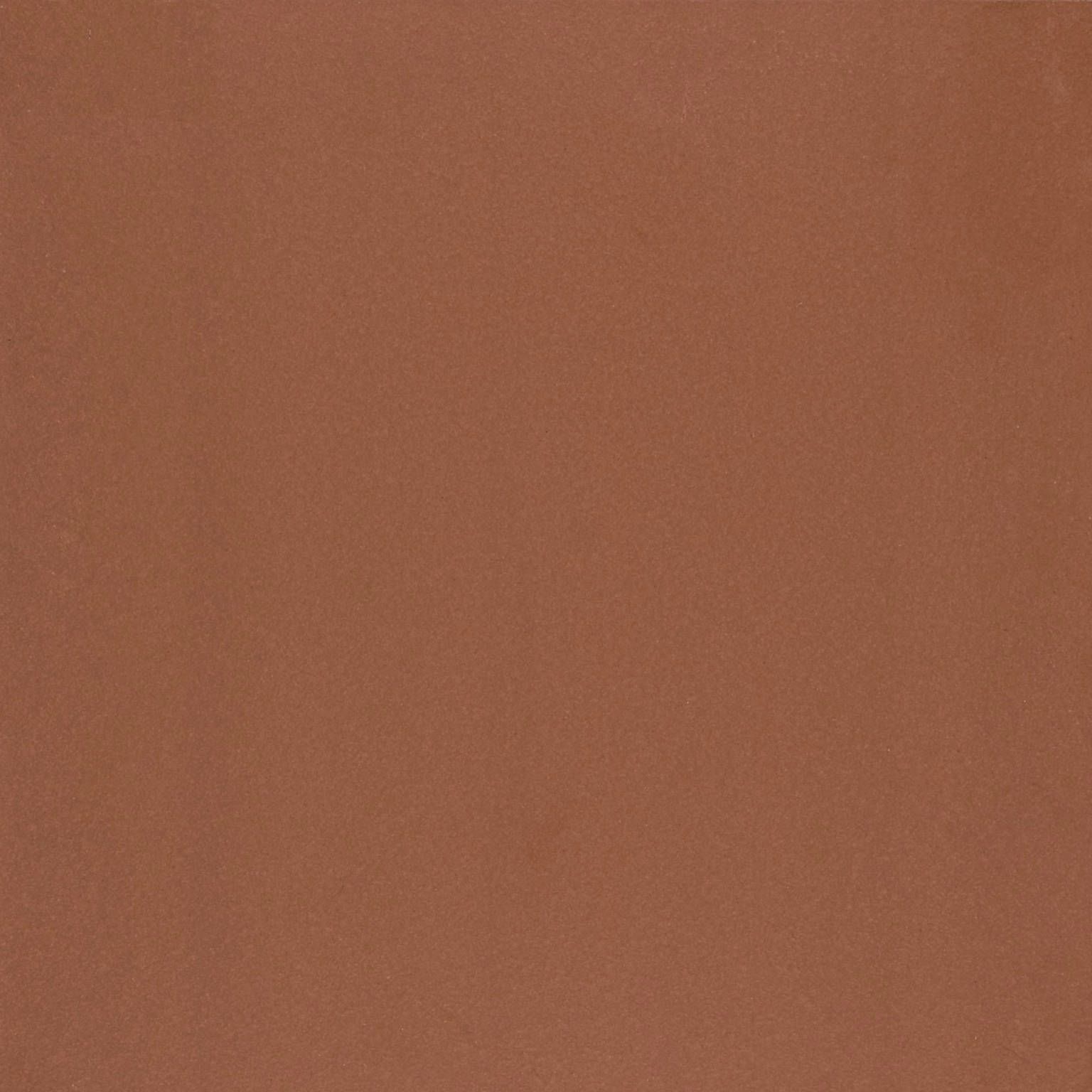 A close up of a brown paper texture.