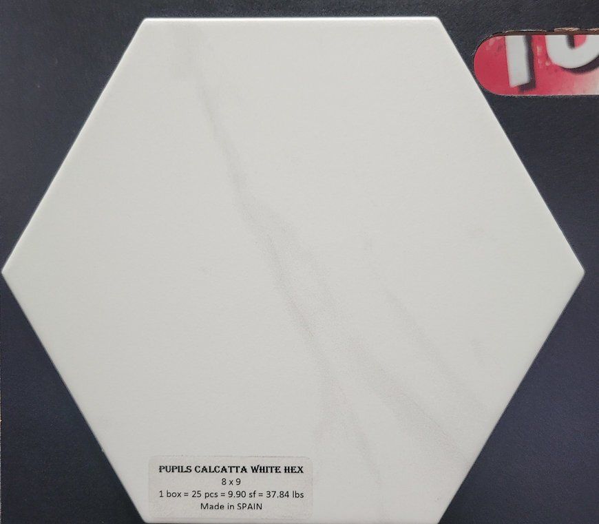 A white hexagon tile with a label on it