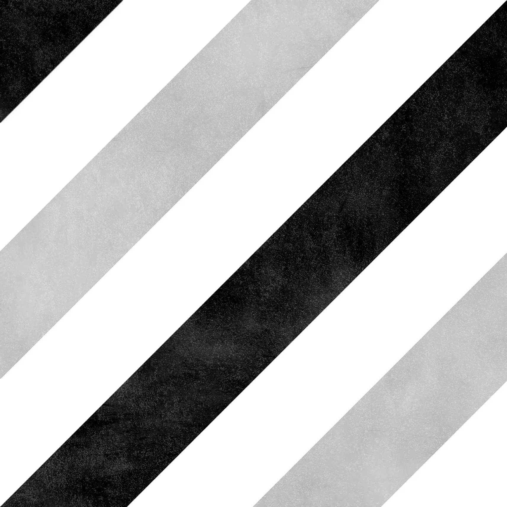 A close up of a black and white striped tile on a white background.