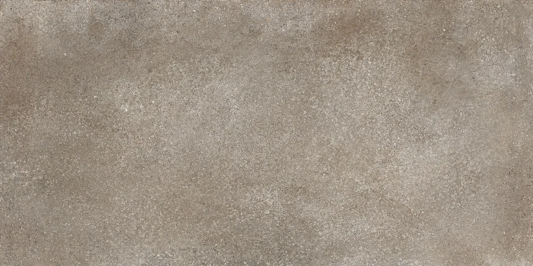 A close up of a brown tile with a grainy texture.