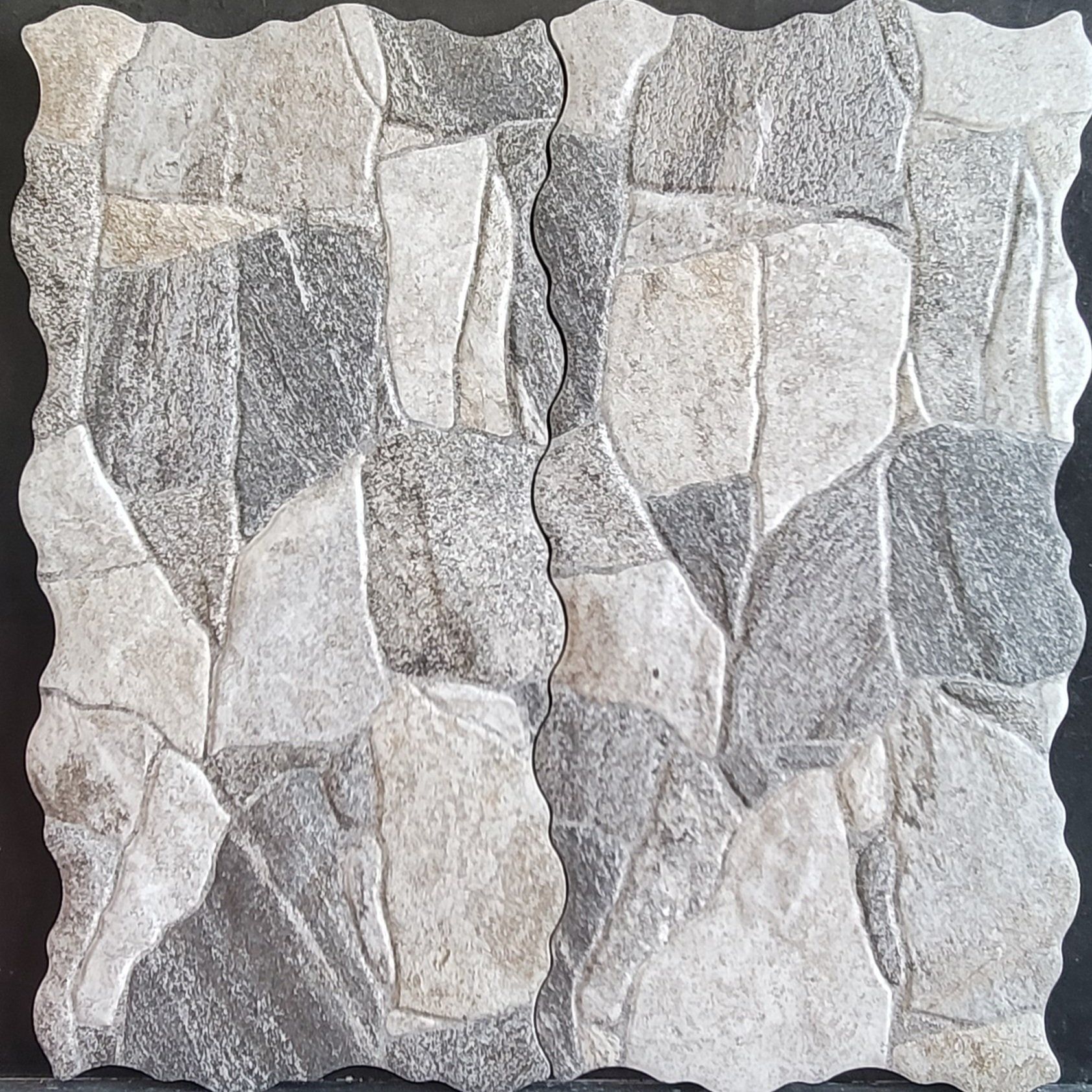 A close up of a tile that looks like a rock wall.