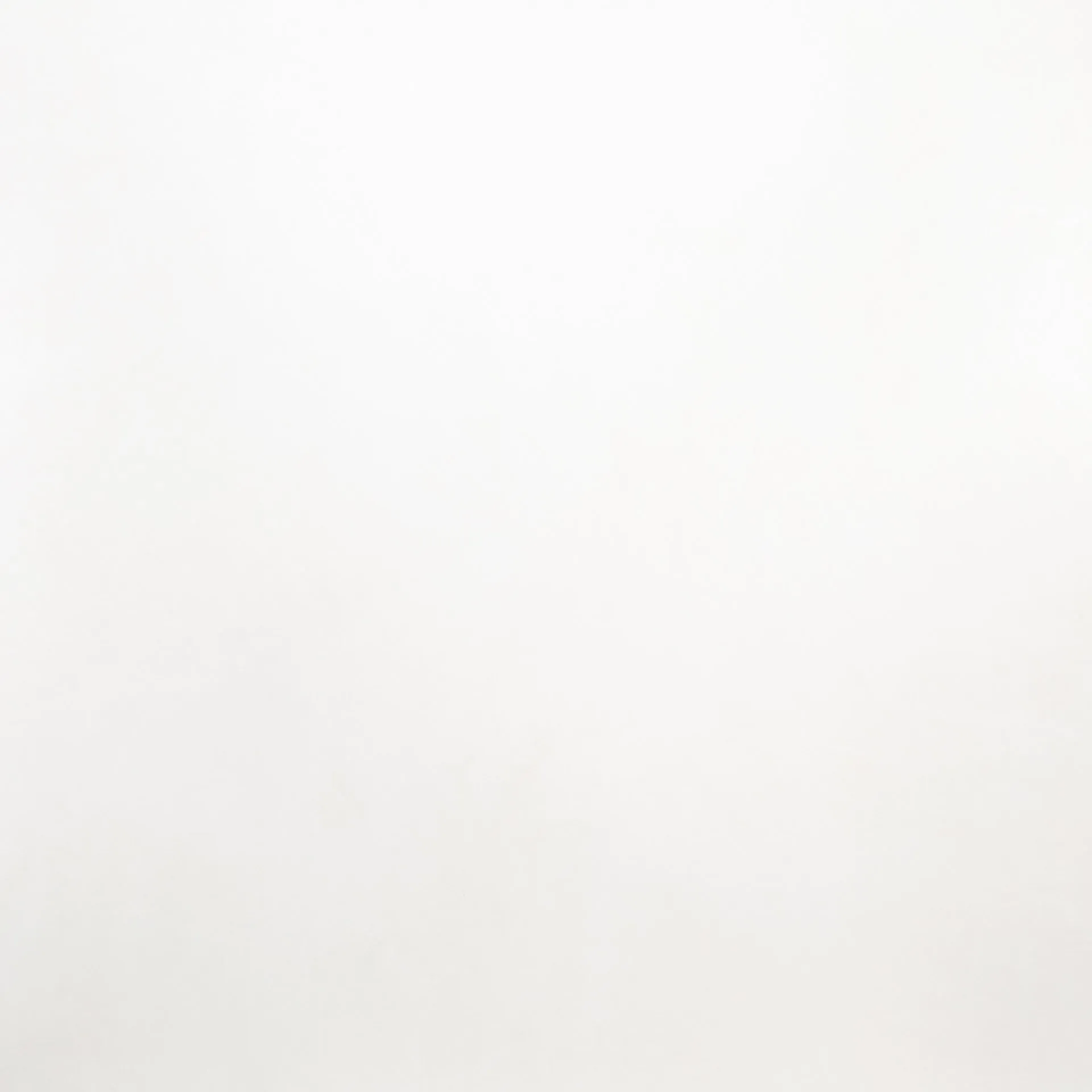 A close up of a white paper texture.