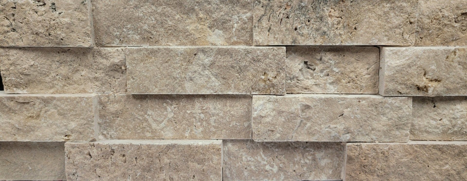 A close up of a brick wall made of bricks.