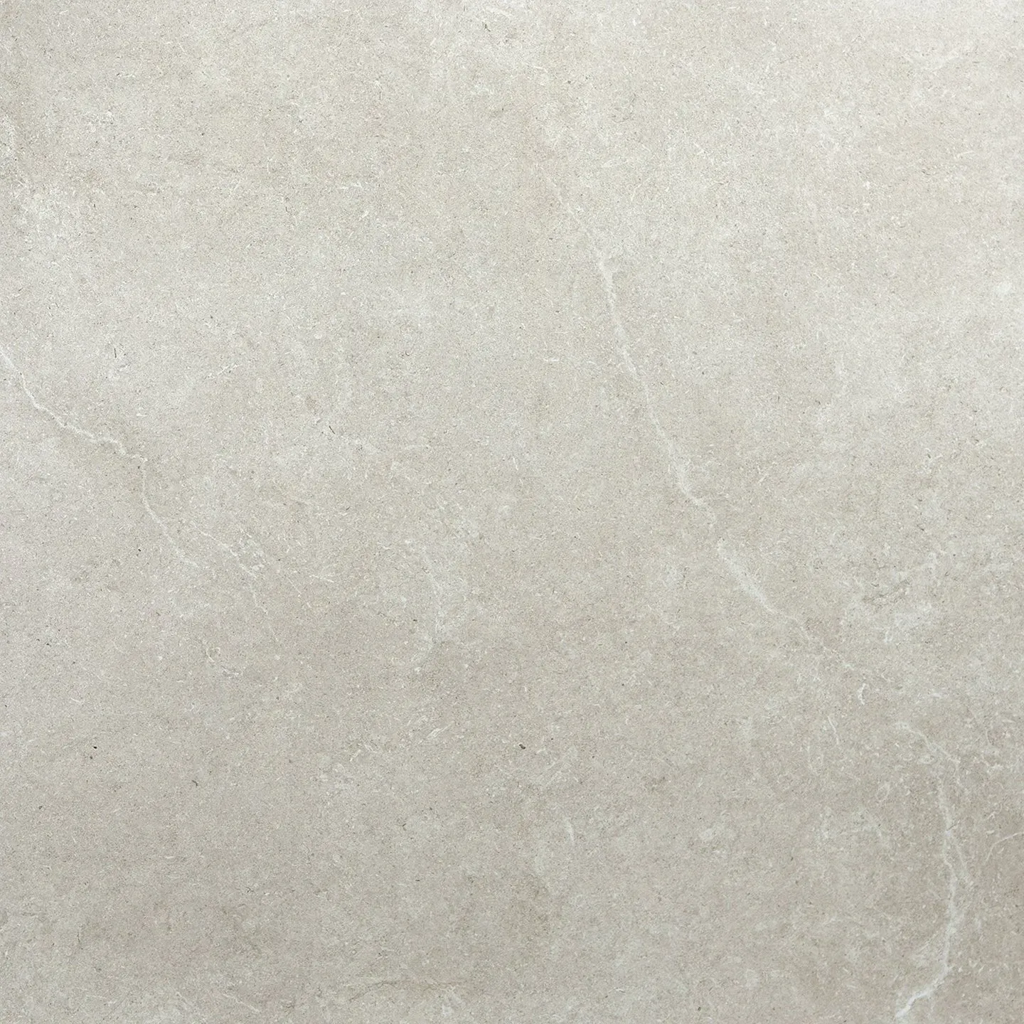 A close up of a white tile with a marble texture.