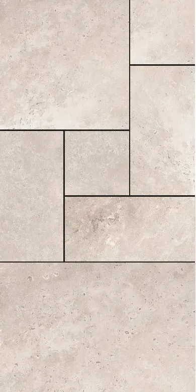 A close up of a tile floor with a geometric pattern.