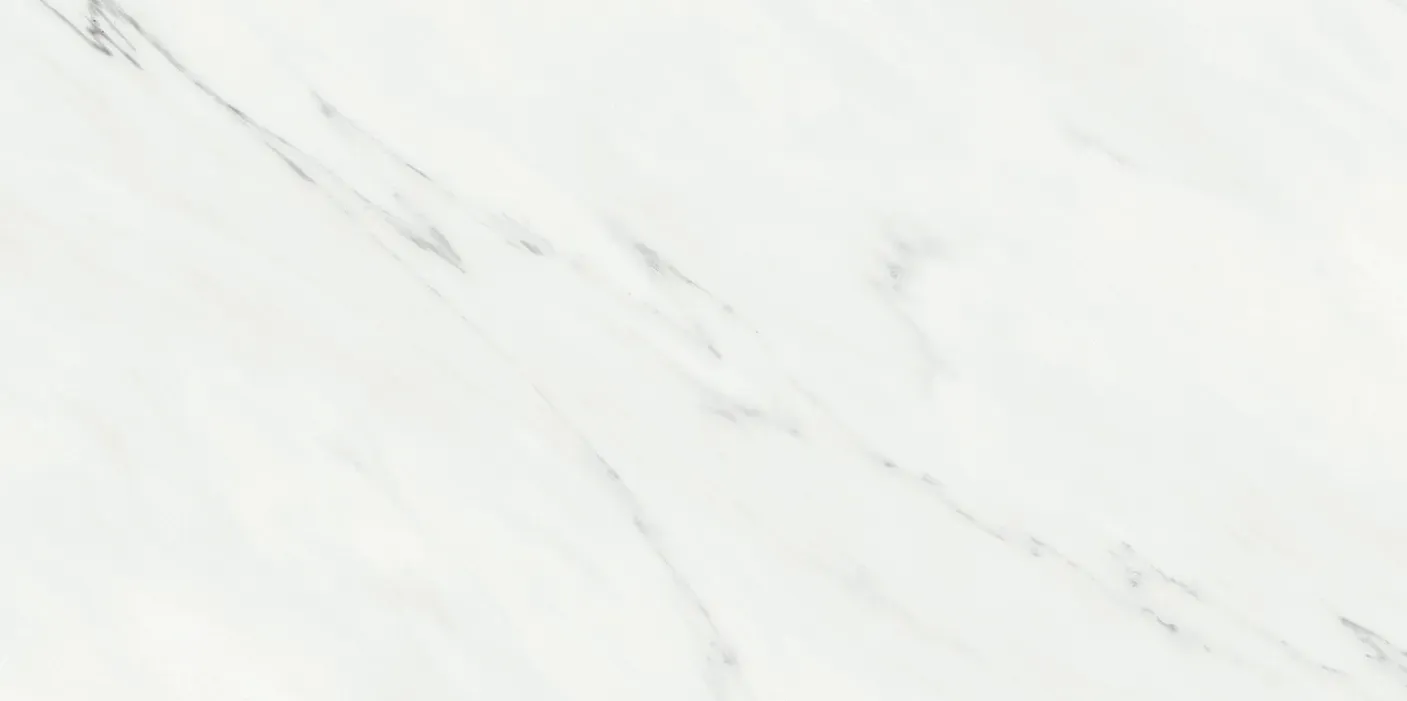 A close up of a white tile with a marble texture.