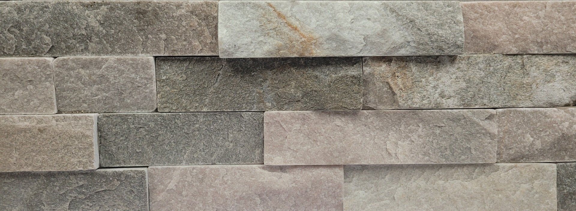 A close up of a brick wall made of bricks.