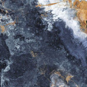 A close up of a blue and gold marble texture.