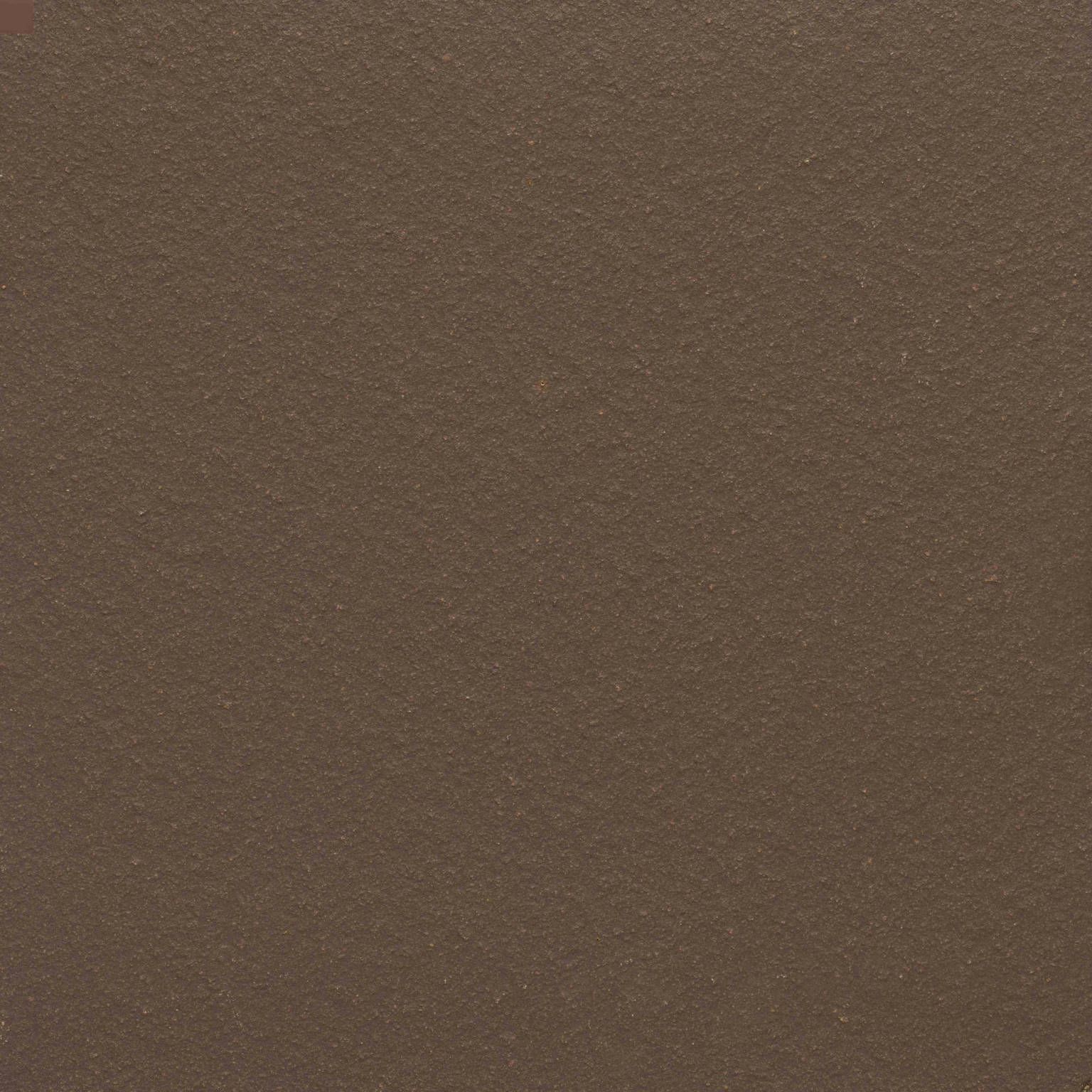 A close up of a brown paper texture.