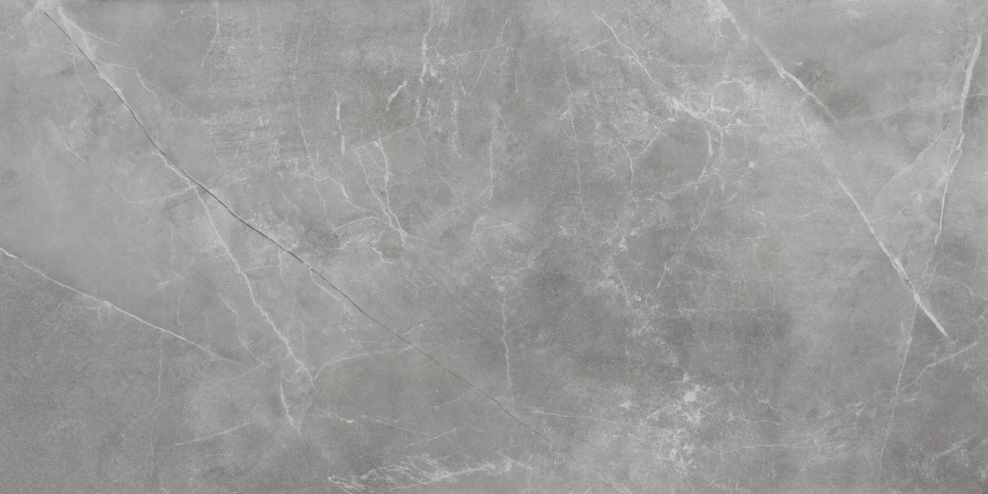 A close up of a gray marble tile with a marble texture.