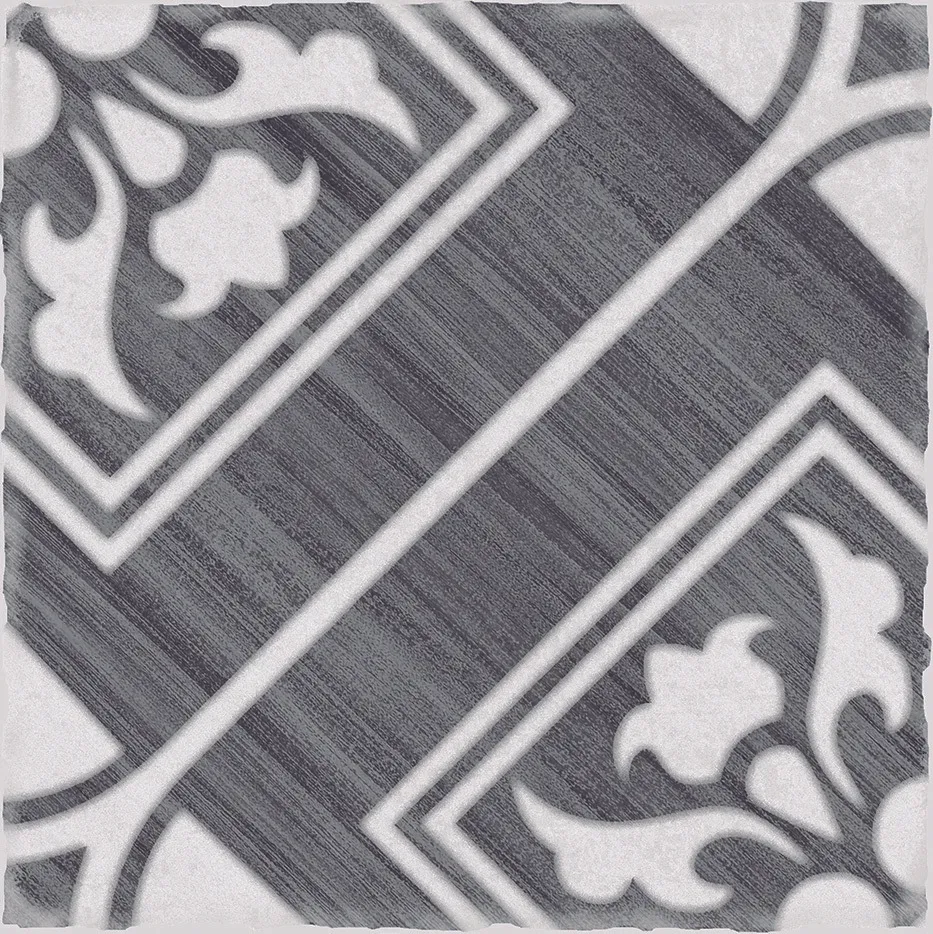 A black and white tile with a floral pattern on it.