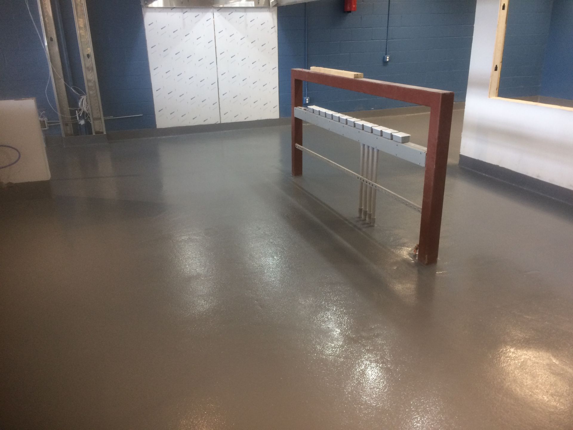 A table in a room with a gray floor