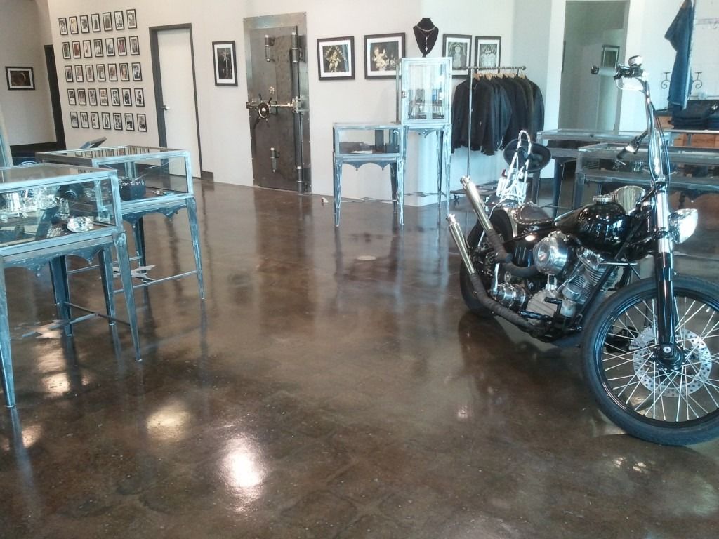 A motorcycle is parked in the middle of a store