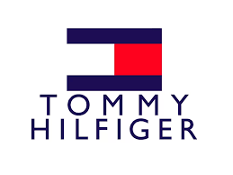 A logo for tommy hilfiger with a red white and blue flag