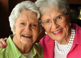 Two elder women smiling