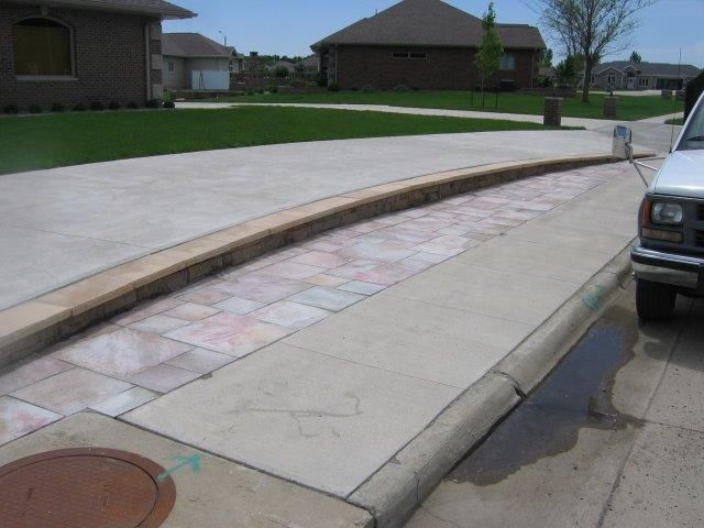 A white truck is parked on the side of the road