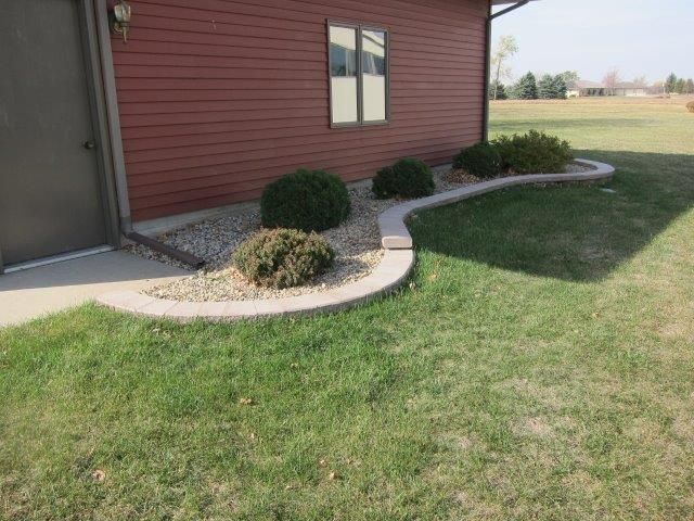 A house with a lawn in front of it