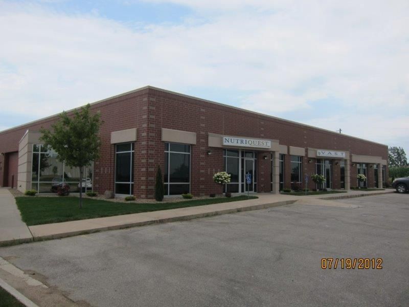 A large brick building with a lot of windows