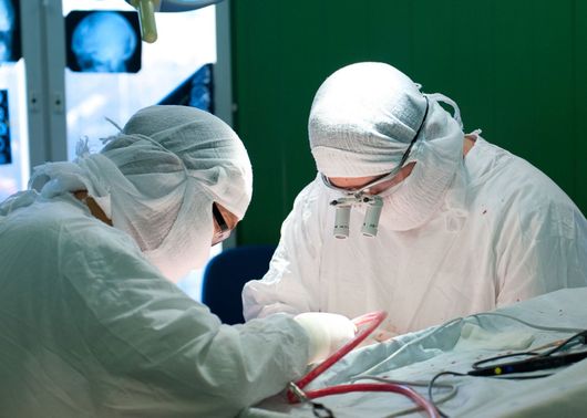 Surgeons working on Patient
